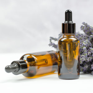 essential oil tincture bottle and lavender